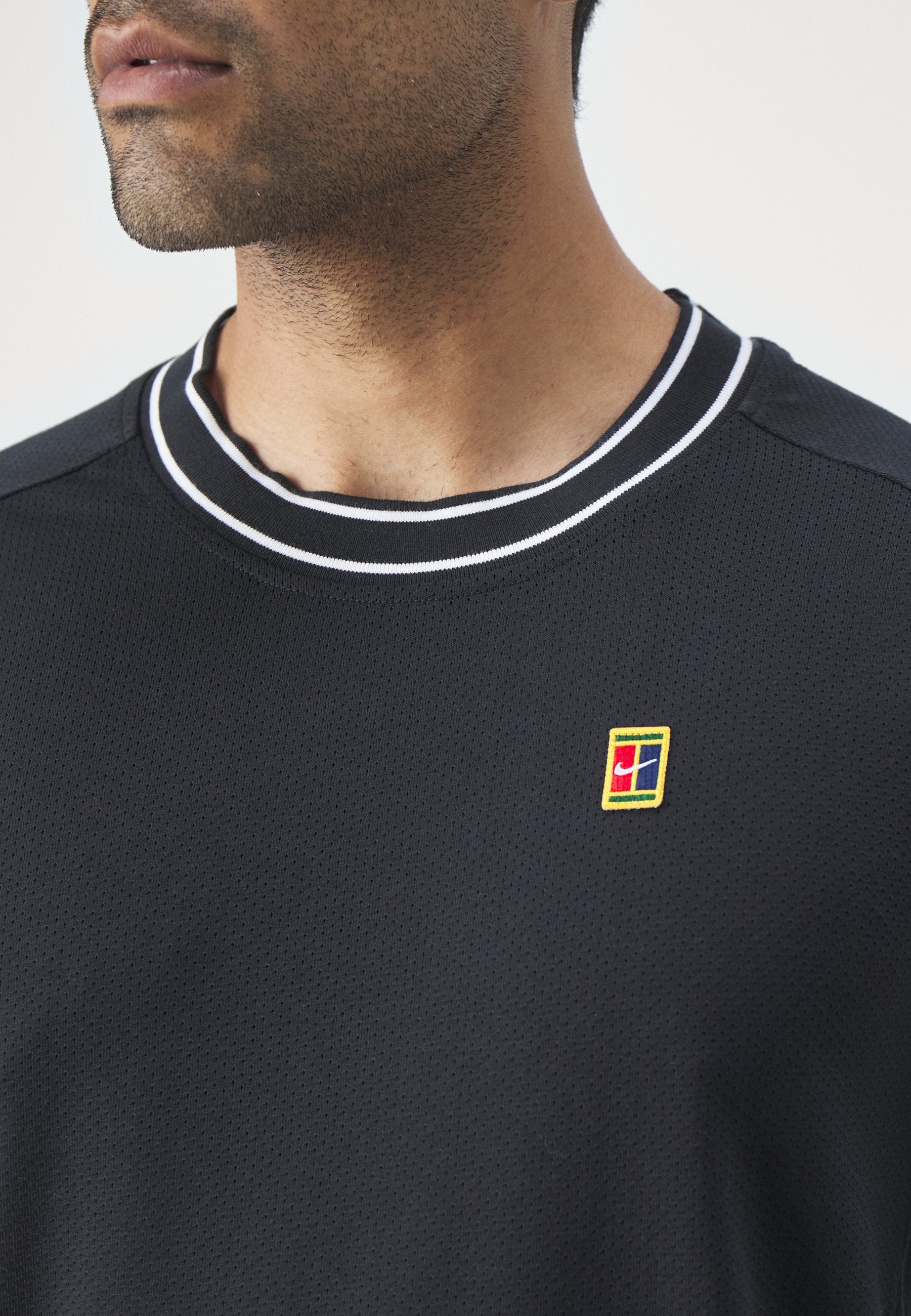 Nike Performance
HERITAGE - Print T-shirt - black